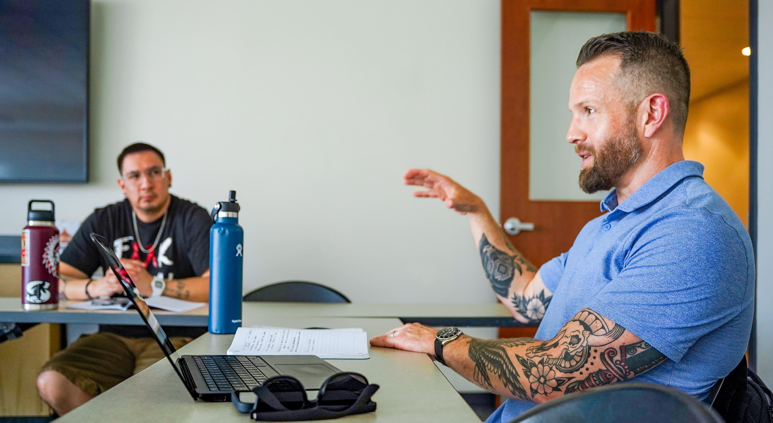 Students in the University of Oregon Strategic Communication Master’s program sit at classroom tables