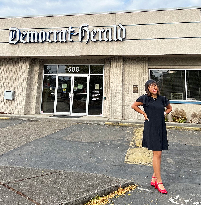 Kayla Nguyen in front of the Albany Democrat-Herald building