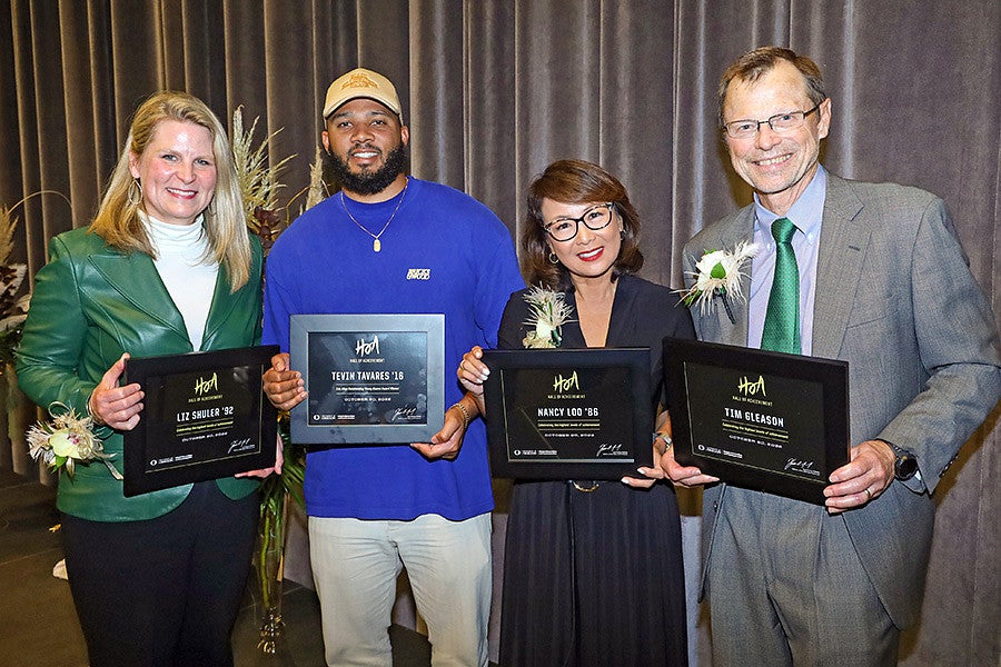 Liz Shuler, Tevin Tavares, Nancy Loo, and Tim Gleason with their Hall of Achievement certificates