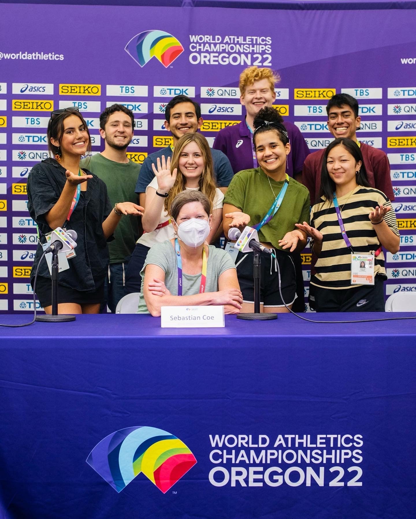 SOJC Track Bureau students pose with Instructor Lori Shontz at a World Athletics Championships Oregon 22 press table 