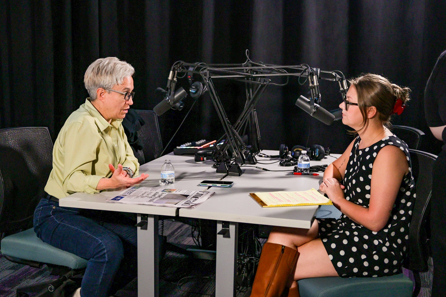Oregon Governor Tina Kotek in a podcast recording studio with UO student Billie Corsetti