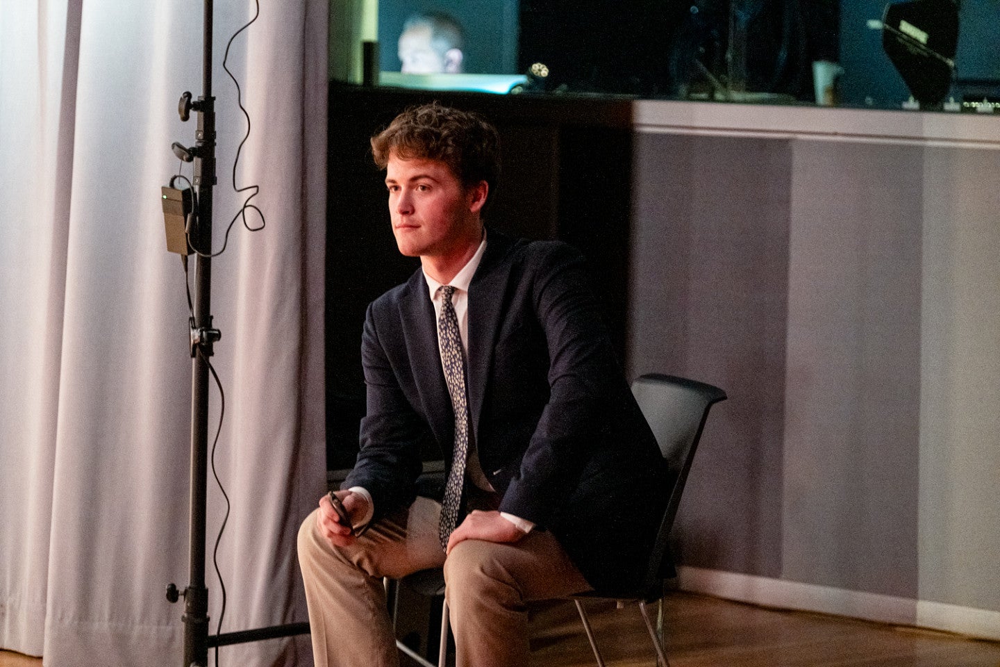 a student wearing a suit 