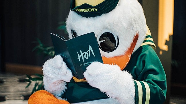 Oregon Duck reading HOA brochure 