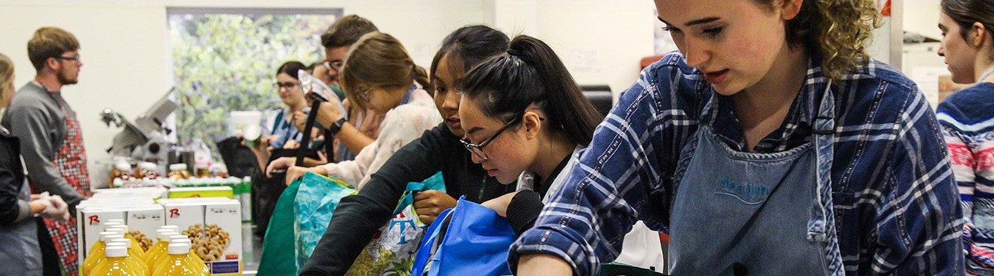 Students in the Media and Social Action Community volunteering at the food bank