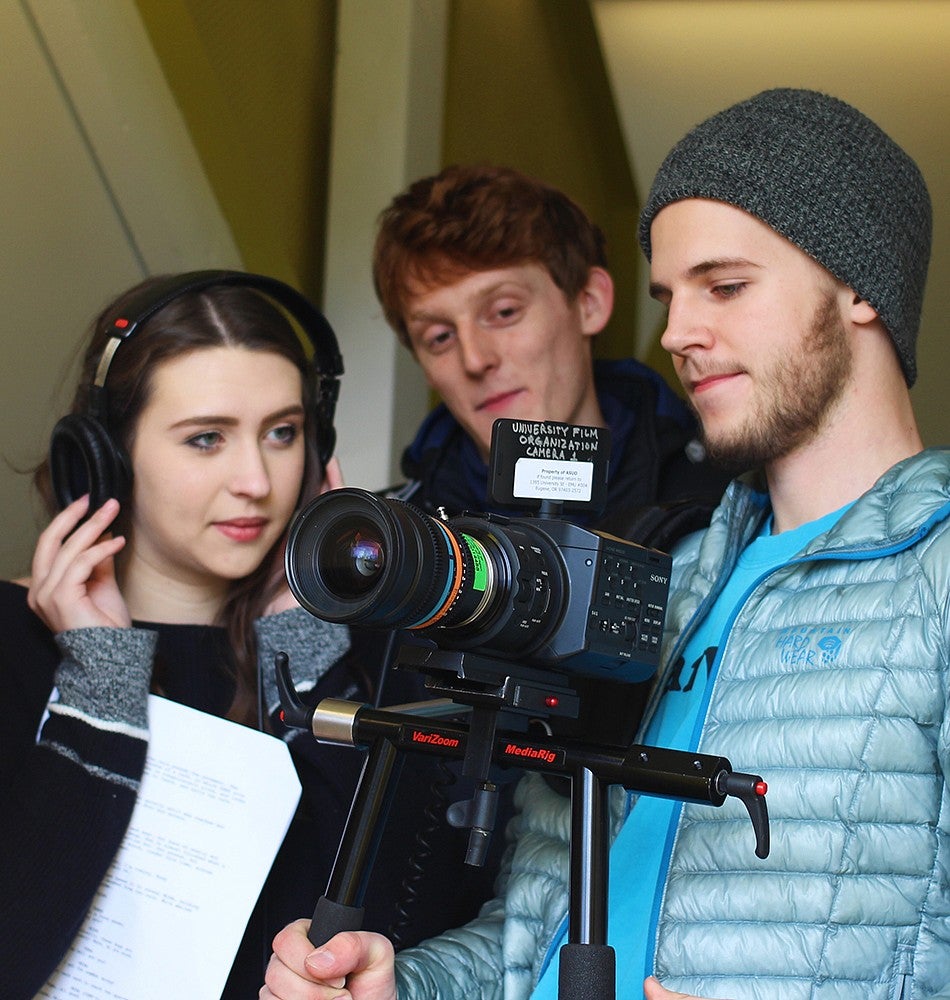 Students filming for Duck TV Three SOJC students filming for Duck TV