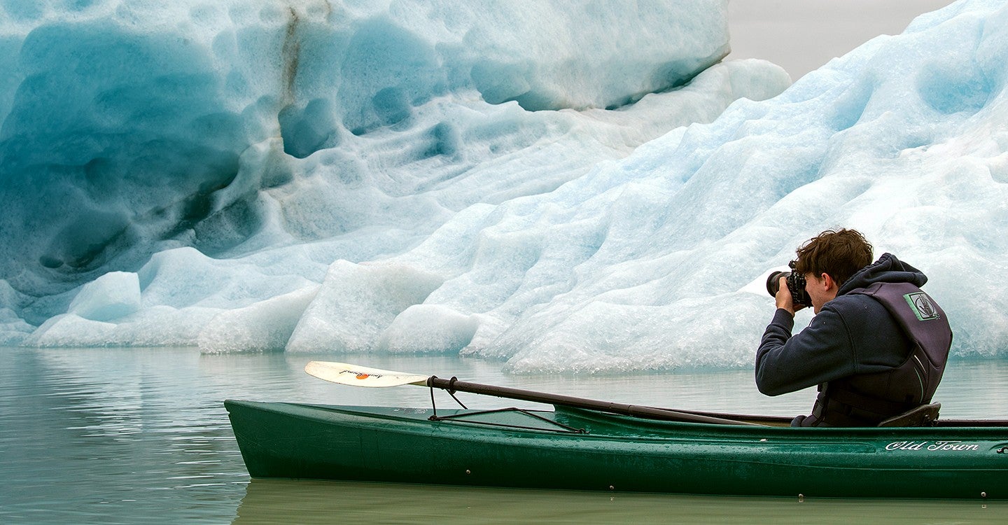 An SOJC student shoots photos of the Sheridan glacier in Cordova, Alaska