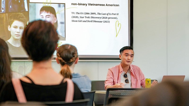 a student gives a presentation to classmates 