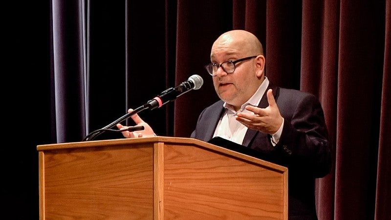 Jason Rezaian delivers the 2024 Ruhl Lecture from a podium
