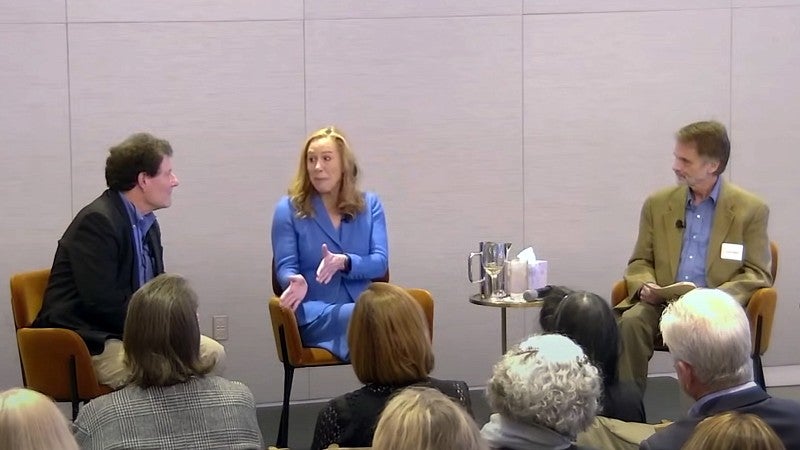 Nicholas Kristof, Kimberly Strassel, and Brent Walth participate in a panel discussion