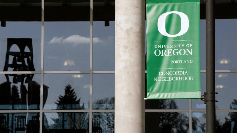lightpole banner with the University of Oregon Portland logo