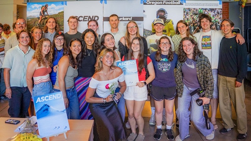 a large group of students pose for a photo