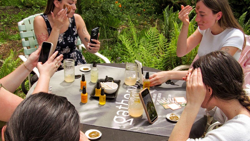 people testing skincare products