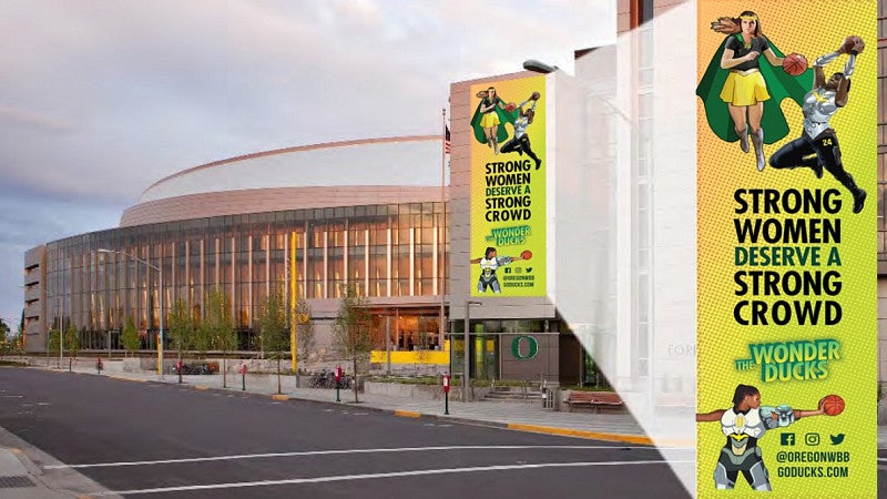 University of Oregon School of Journalism and Communication Allen Hall PR student work outside Matthew Knight Arena 