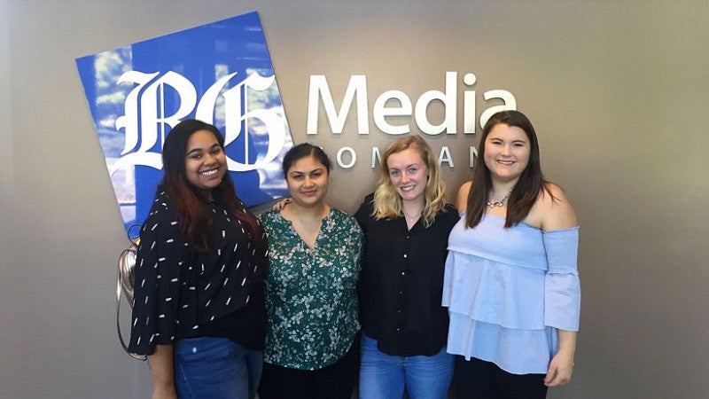 Bailee Walker, Hansika Rau, Vanessa Gibson and Lauryn Pan tour The Register-Guard office.