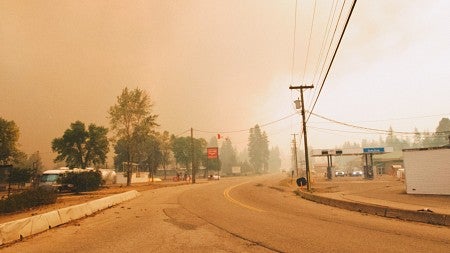 a small town with thick wildfire smoke