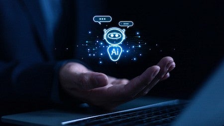 an AR robot appears hovering over a person's hand