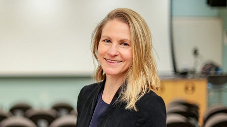 portrait of Whitney Phillips in a classroom