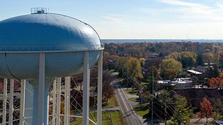 aerial view with water tower in the foreground