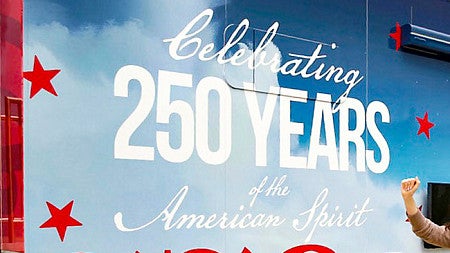 decal on the side of a truck that says "Celebrating 250 Years of the American Spirit"