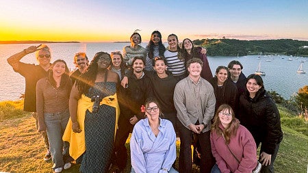 a group of University of Oregon School of Journalism and Communication students pose in New Zealand