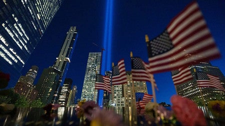 Stock image of two beams of light emanating from the site of the World Trade Center towers in New York City