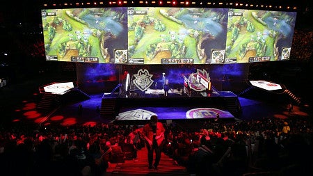 A stadium with people for an online gaming tournament.