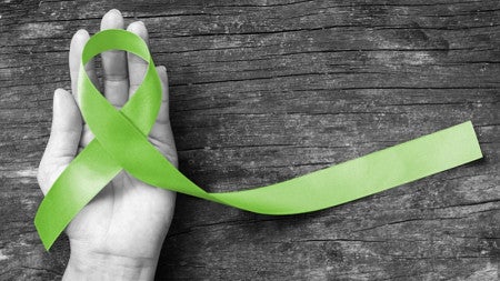 Mental health green ribbon awareness. 