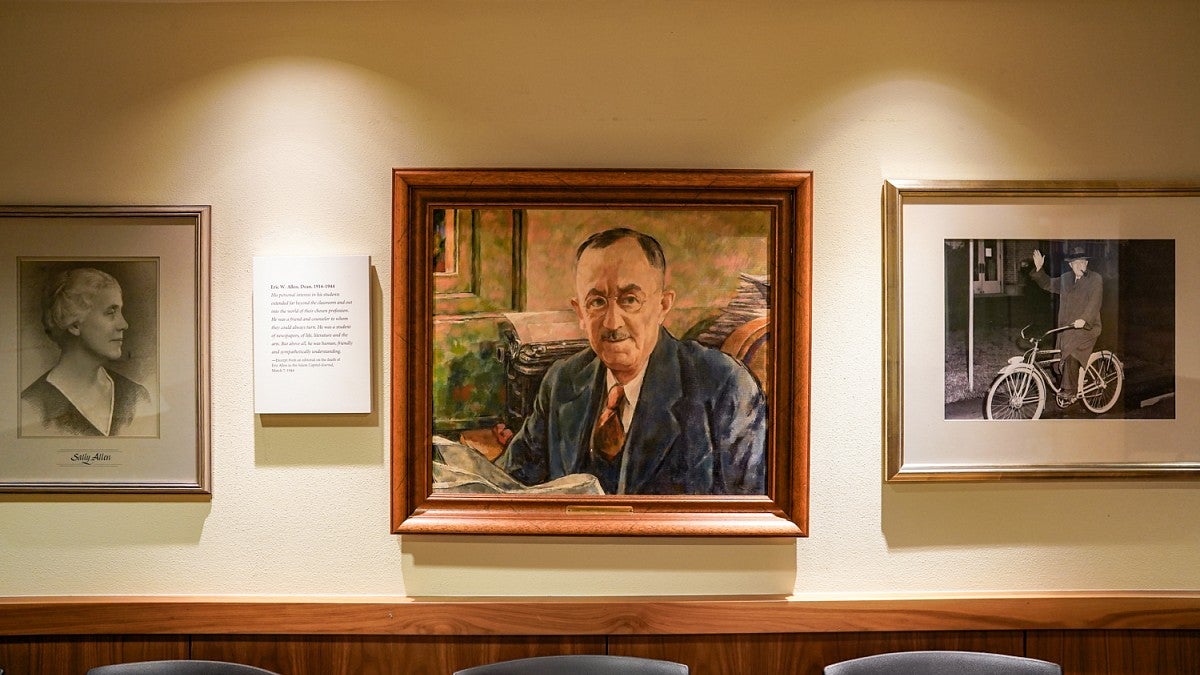 framed portraits of Eric W. Allen and Sally Allen hang on the wall of the Allen Room on the University of Oregon campus