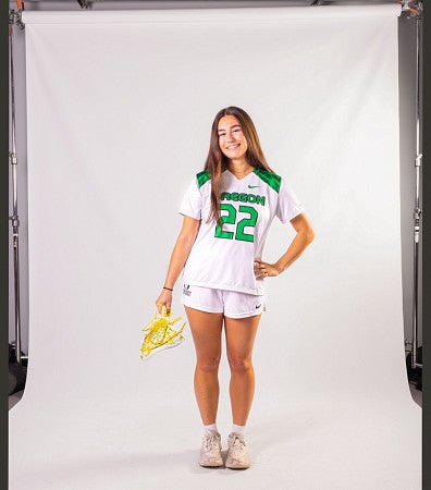 portrait of Ava Martinez wearing a University of Oregon Lacrosse uniform