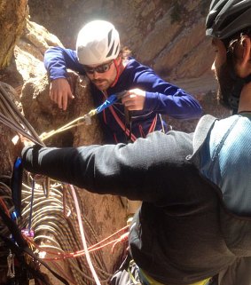 Jack Fisher climbing rocks in Eldorado Canyon, Colorado 