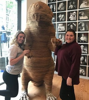 Vanessa Gibson and Lauryn Pan meet the famous beaver statue that decorates ad agency Wieden+Kennedy’s downtown Portland office.