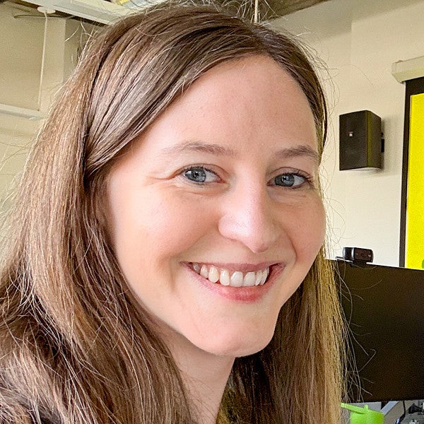 portrait of Kathleen Darby, an immersive media communication master’s alum, taken in the Oregon Reality Lab