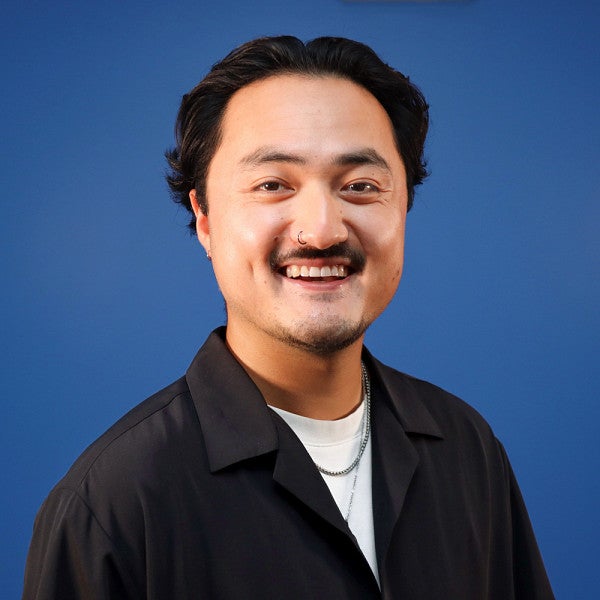 portrait of University of Oregon advertising alum Drew Miyoda