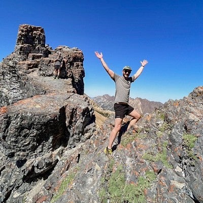 John Sutter hikes a rocky ridgeline near Salt Lake in Utah