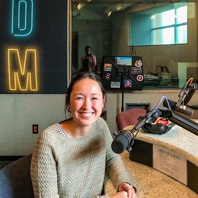Nikki McClaran sits in a recording studio