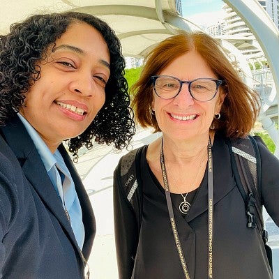 Ammina Kothari and Leslie Steeves pose for a selfie