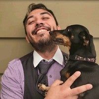 Phil Benavides and a dog