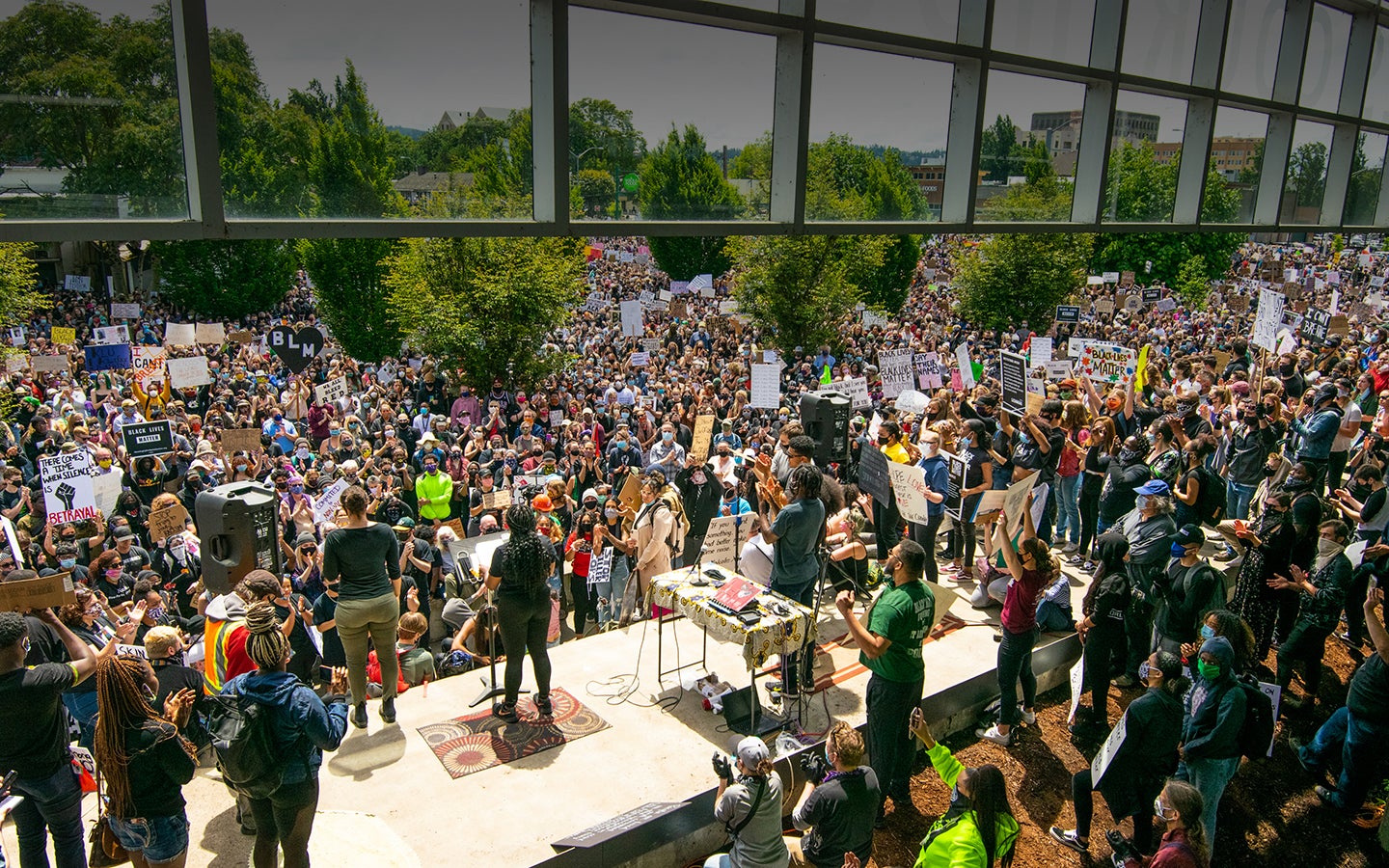 A rally in support of the Black Lives Matter movement held in downtown Eugene, Oregon in May 2020. Photo by Kimberly Harris. A rally in support of the Black Lives Matter movement held in downtown Eugene, Oregon in May 2020. Photo by Kimberly Harris.