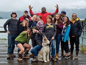 SOJC students goofing off on a dock overlooking the water in Alaska