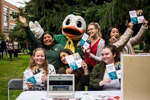 Members of PRSSA 2019-2020 post with the UO Duck
