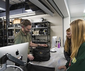 students check out camera equipment from the Allen Hall J-Cage students check out camera equipment from the Allen Hall J-Cage