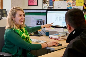 an SOJC advisor works with a student