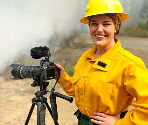 Miranda Daviduk takes photos of a wildfire