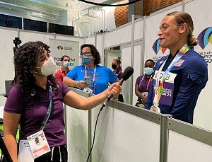 SOJC student Mackenzie Days interviews gold medalist Anna Hall at the World Athletics Championships Oregon22