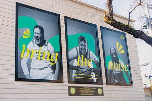 large posters featuring members of the 2021-22 UO Women's Basketball team, designed by Allen Hall Advertising Agency