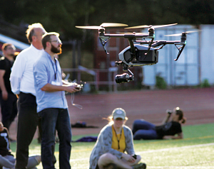 Student flying a drone Student flying a drone