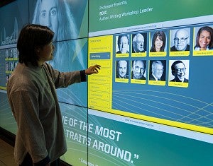 Student explores in the interactive Hall of Achievement touchscreen display. This feature includes information on the Hall of Achievement inductees. 