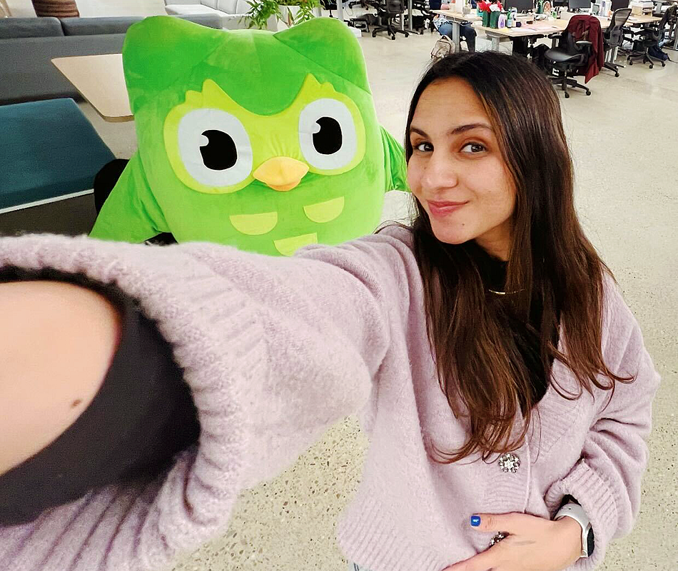 Zaria Parvez takes a selfie with Duo, the (in)famous green Duolingo owl