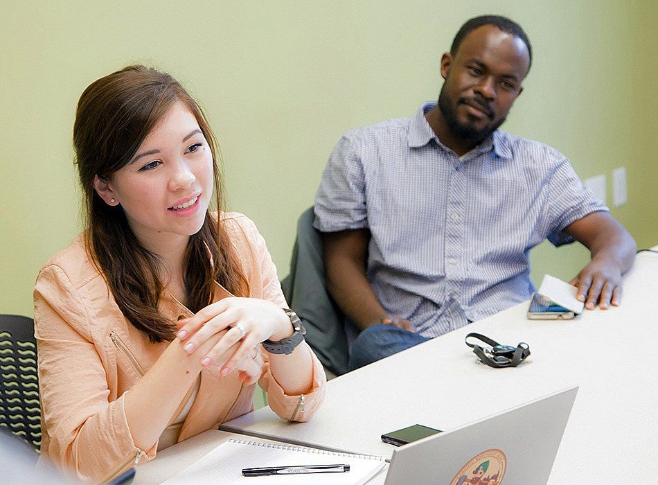 two students sitting in a discussion class