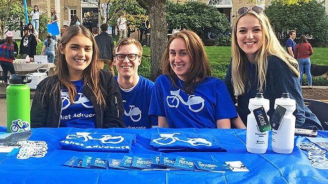 Allen Hall PR students giving out information about the PeaceHealth Rides program Allen Hall PR students giving out information about the PeaceHealth Rides program